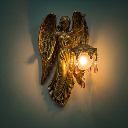 Golden Angel lantern glowing at night